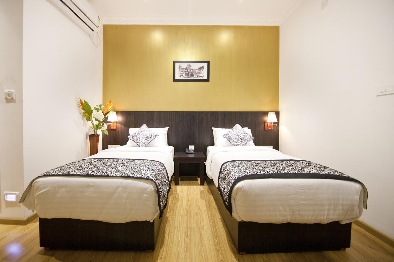 Comfy Luxury Hotel บังกาลอร์ ภายนอก รูปภาพ